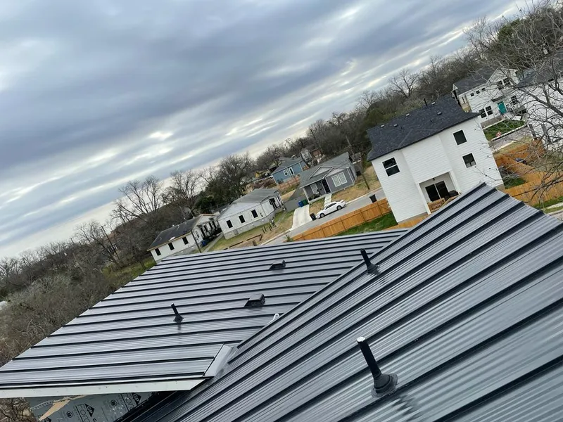 Standing seam metal roof panels with vents for Skylight Repair in Wyldwood